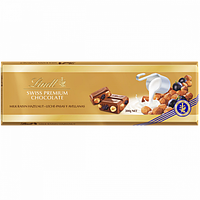 Молочный шоколад Lindt Swiss Premium с цельным фундуком и изюмом 300 г