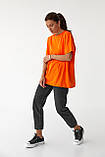 Жіноча трикотажна футболка з принтом на спинці - оранжевий колір, M (єсть розміру), фото 3