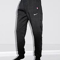 Мужские тёплые спортивные штаны на флисе 60 размер на манжете