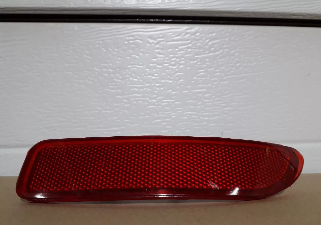 Відбивач (катафот) заднього бампера лівий Renault Logan Рено Логан (2009-2012) 8200751779, фото 1