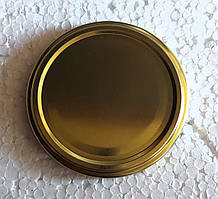 Золотиста кришка для консервування то 77 мм