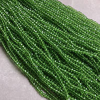Намистини Чеський Кришталь на волосіні світло-зелене прозоре гранований рондель d-3,5х3мм + - L-36-38см + -