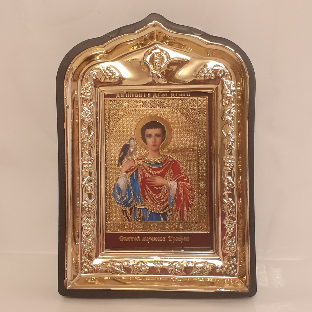 Ікона Трифон святий мученик, лик 6х9, у пластиковій чорній рамці