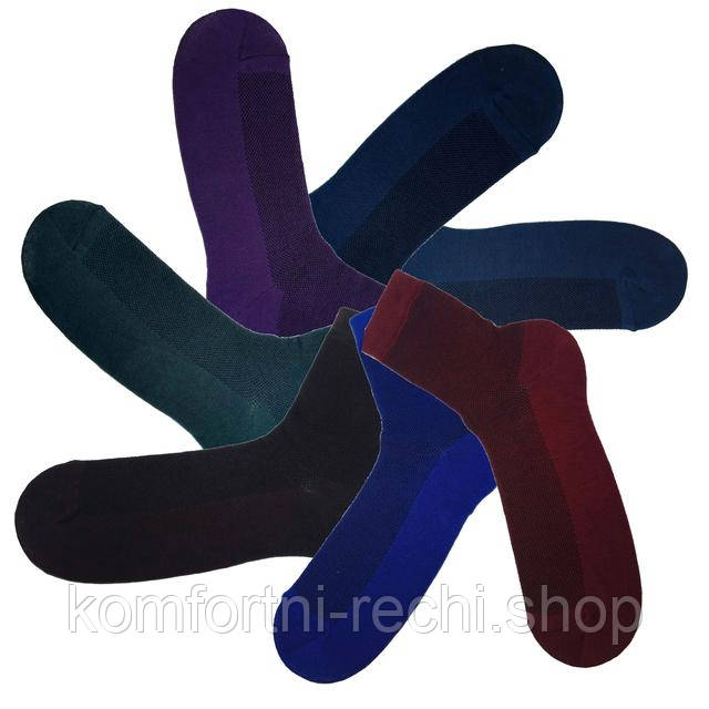 Шкарпетки чоловічі середні сітка літні різнокольорові бавовняні житомирські, подарунковий комплект для чоловіків, набір з 12 кольорових однотонних пар з сіткою (бордові, бірюзові, зелені, коричневі, сині, фіолетові), середньої довжини, 1 сорт, розмір 25-27. Характеристики: тип – трикотажные; тип ткани – хлопок, разноцветные однотонные; длина изделия – 28 см; цвет – разные цвета (ассорти); количество пар в наборе – 12; размер носков – 25-27 ; состав – хлопок 75%, полиэстер 22%, эластан 3%; сорт: первый.