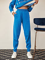 Женские трикотажные брюки-джоггеры на резинке синего цвета. Модель 2434 Trikobakh