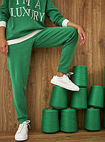 Женские трикотажные брюки-джоггеры на резинке зеленого цвета. Модель 2434 Trikobakh