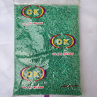 Бісер дрібний прозорий з зеленою серединкою