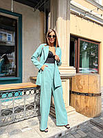 Стильный брючный женский костюм удлиненный пиджак S-M L-XL (42-44 46-48) брюки клеш расклешенные ОЛИВКА 46-48