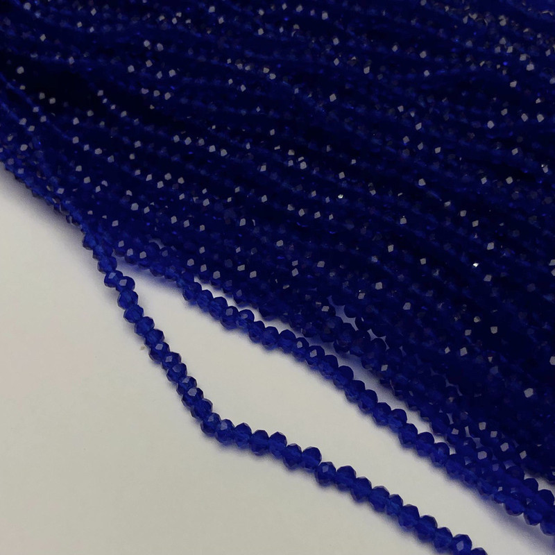 Намистини Чеський Кришталь на волосіні темно-синє прозоре гранований рондель d-3х2,5мм + - L-36-38см + -