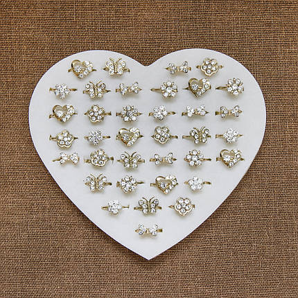 Колечки детские металлические с белыми стразиками бабочки сердечки цветочки регулируемые в наборе 36 штук, фото 2
