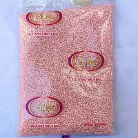 Бісер дрібний прозорий з ніжно рожевою серединкою