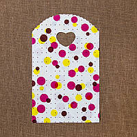 Пакет поліетиленовий подарунковий білий із різнобарвними кружечками, ручка сердечко розмір 21х13 см паковання 50 шт.