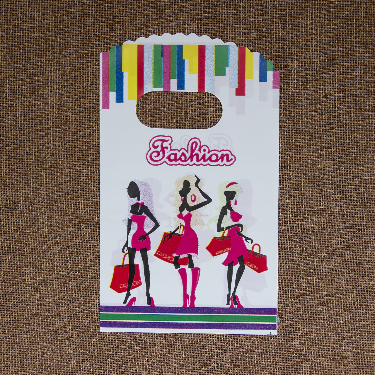 Пакет поліетиленовий подарунковий білий різнобарвний із написом Fashion ручка банан розмір 15х9 см паковання 50 шт. - фото 1 - id-p1683108527