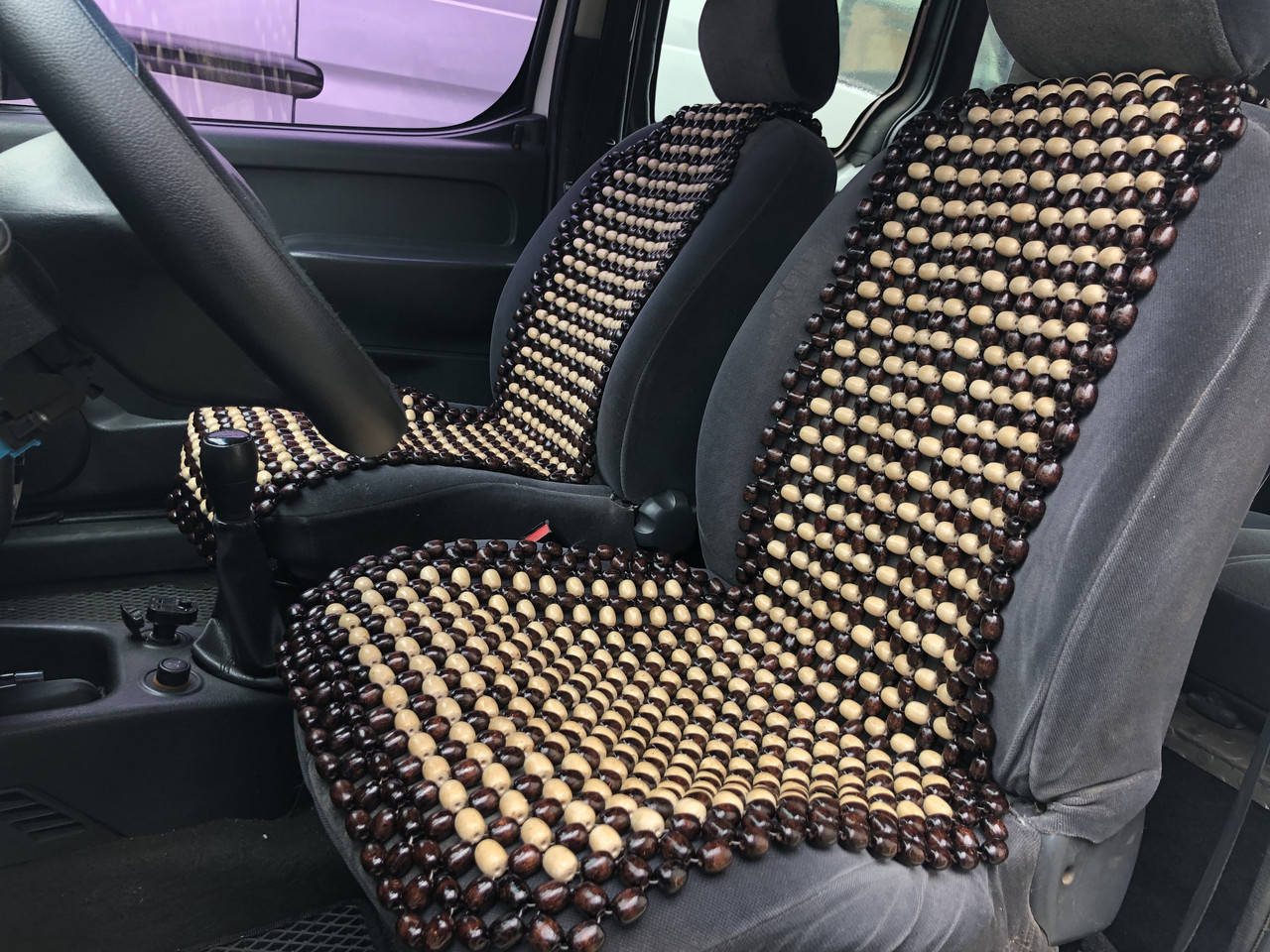 

Деревянная автомассажная накидка на сиденье автомобиля.