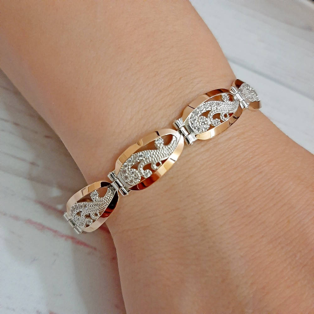 

Красивый женский серебряный браслет с золотыми пластинами и фианитами "Ульяна"