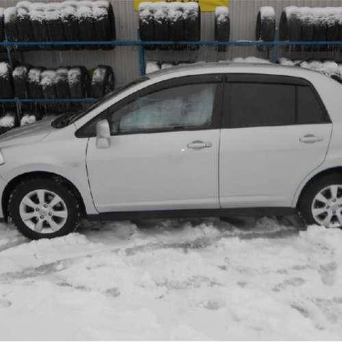 

Дефлекторы окон ветровики Ниссан Тиида 1 Nissan Tiida I 04-11 КТ (Накладные)