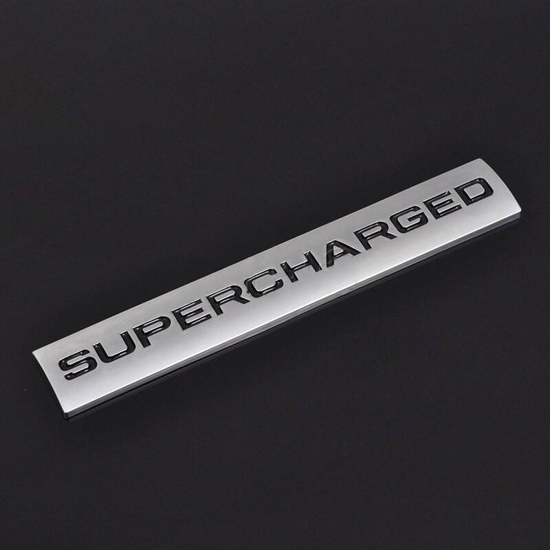

Лого SUPERCHARGED на крышку багажника, передние крылья