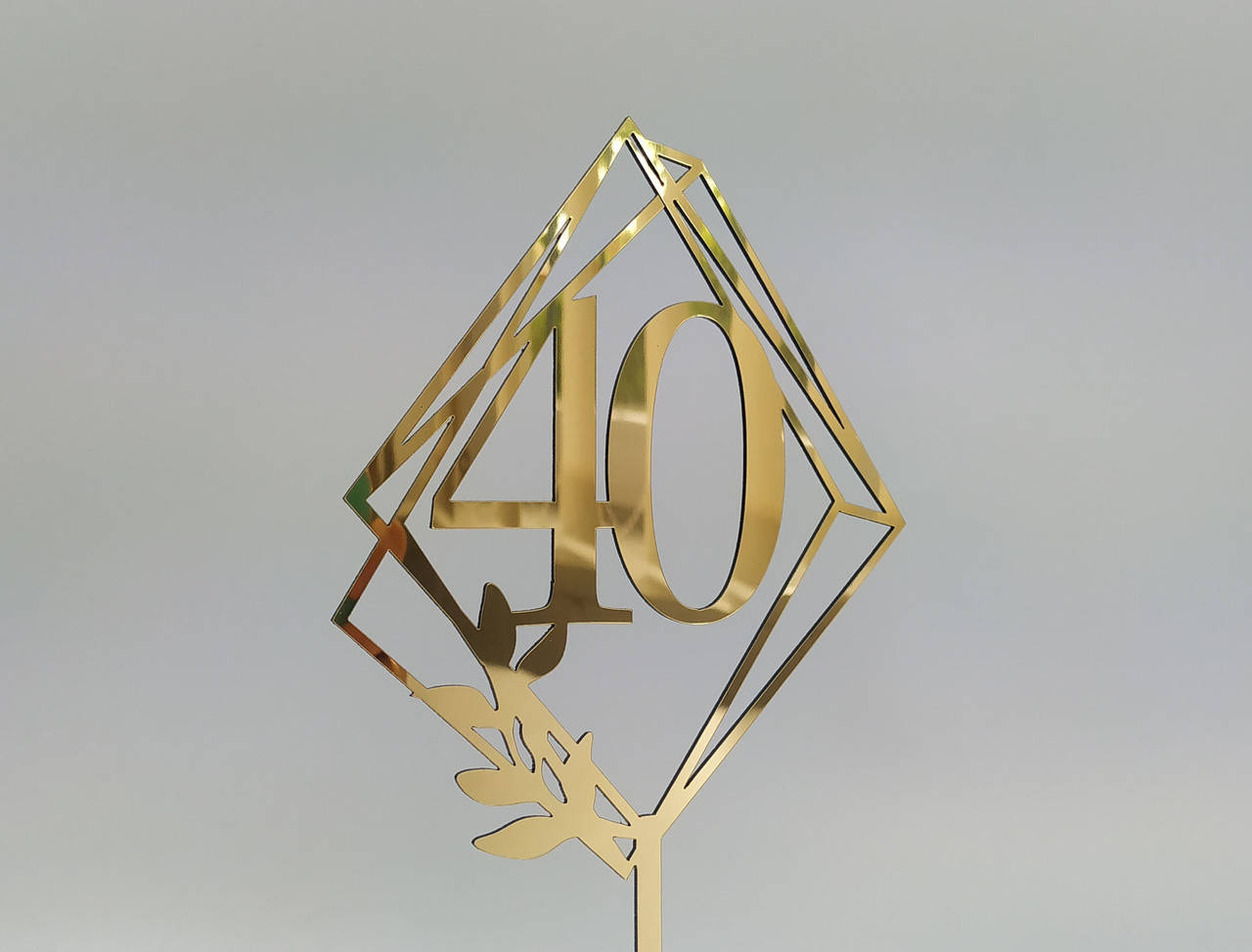 

Топпер в торт зеркальный пластик золотой цифра 40