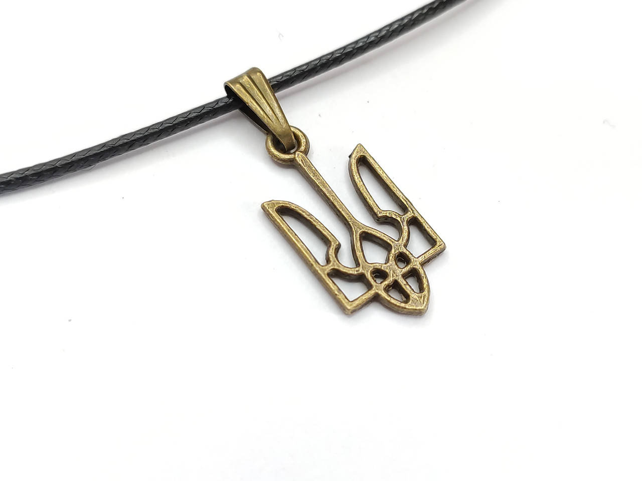 

Подвеска маленький тризуб на шнурке античная бронза 23х12мм