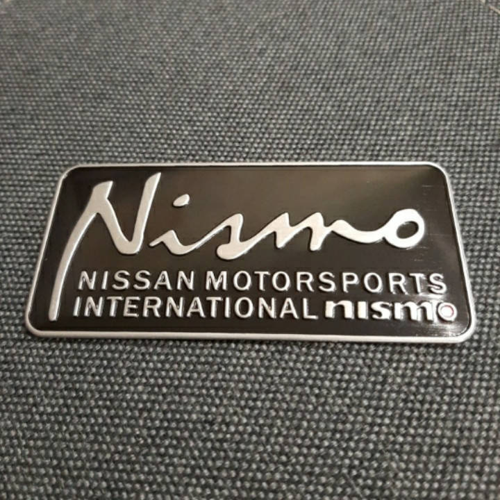 

Наклейка на авто Nissan 90×42 мм.