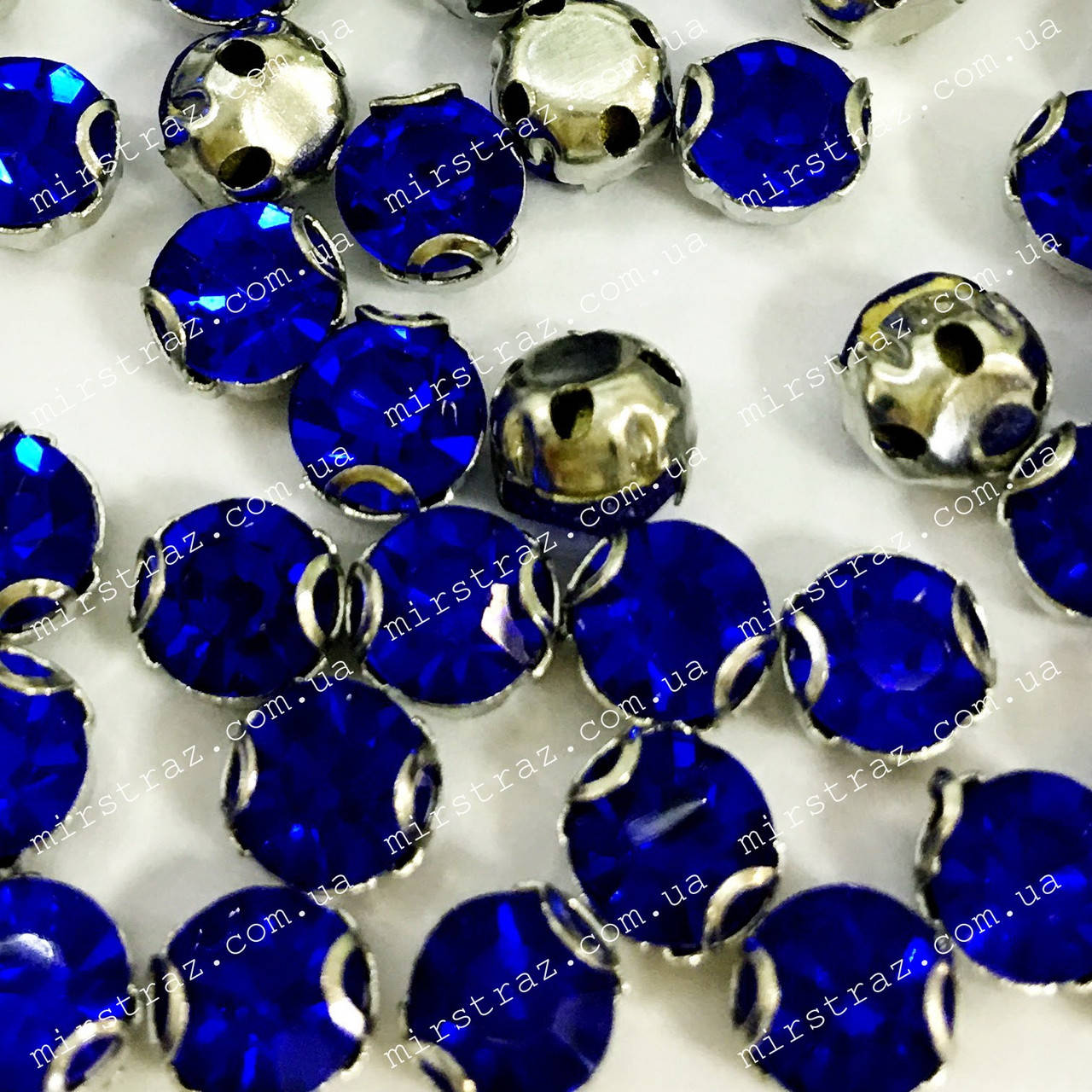 

Круглые стразы в цапах 5мм, цвет Cobalt, Белый