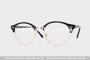 Кругла чорно-золотиста оправа для окулярів для зору. Пластик із металом