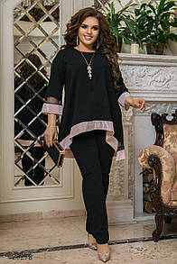 Жіночий чорний брючний костюм з вільною блузою великі розміри