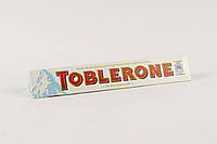 Белый шоколад Toblerone медово-миндальной нугой 100g (Швейцария)