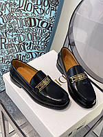 Женские черные кожаные туфли лоферы Dior Code на массивной тракторной подошве Диор с золотой пряжкой