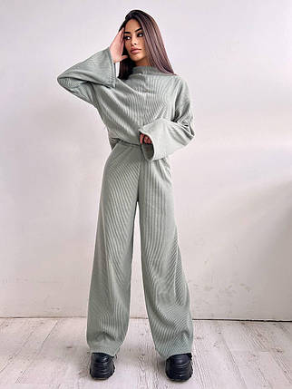 Стильний жіночий теплий костюм кофта під горло та розклешені штани трикотаж рубчик Db5135, фото 1