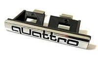 Шильдик эмблема в решетку радиатора Audi "Quattro" Значок ауди кватро в решетку радиатора