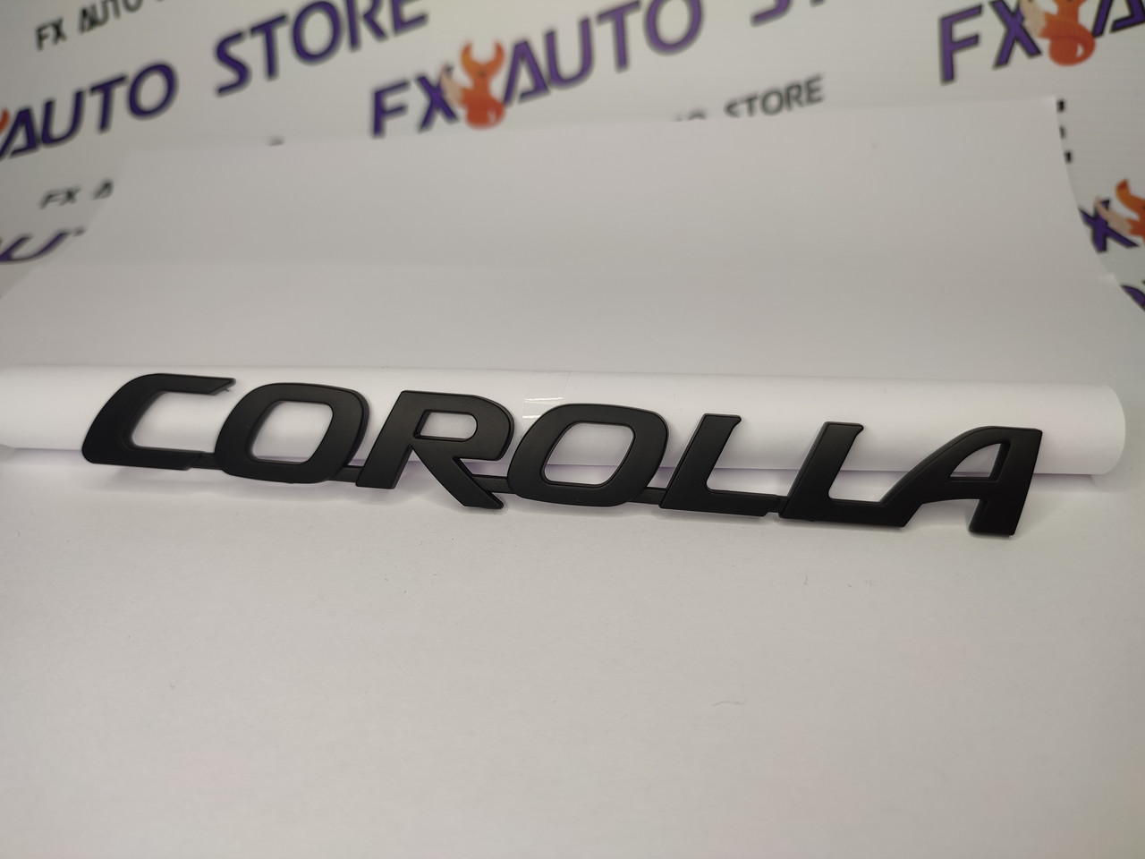Емблема шильдик логотип COROLLA 170*19 мм чорна глянцева, фото 1