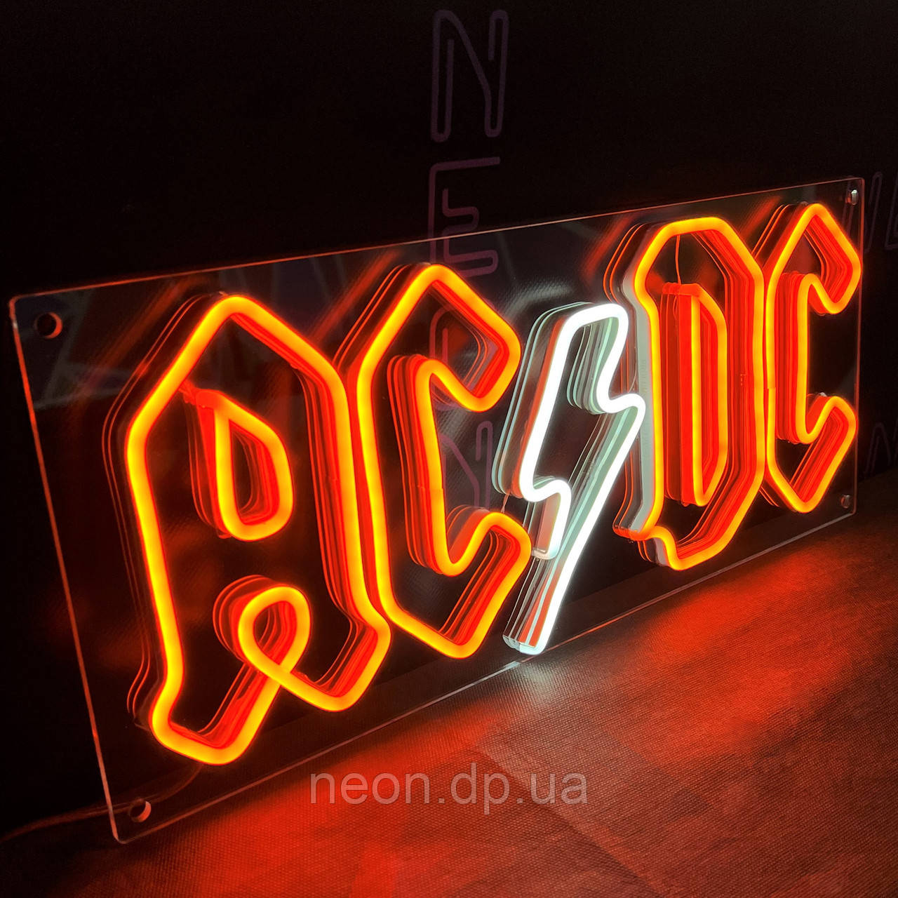 Неонова вивіска "AC DC"