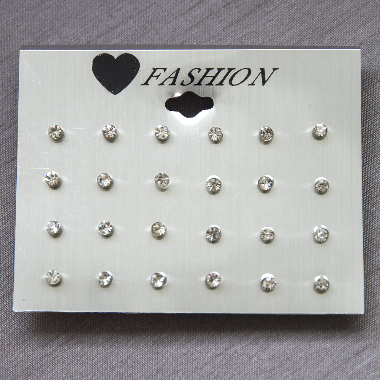 Серьги гвоздики пуссеты серебристого цвета Fashion Jewerly с белыми кристаллами размер 3х3 мм набор из 12 пар - фото 1 - id-p1689482689