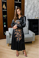 Нарядна жіноча чорна блискуча сукня-міді із запахом вишита квітами та довгим рукавом Орфея