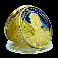 Монета Президент України Володимир Зелений Три вістря трезуба також символізують перемогу золота