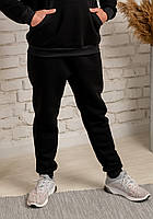 Теплые мужские спортивные брюки черного цвета на флисе с карманами
