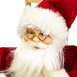 Санта у кріслі качалці 30*20 см фігурка під ялинку для новорічного декору, фото 3