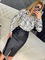 Жіноча шкіряна спідниця міді