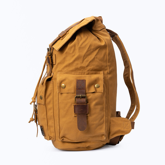 Фото чоловічого вінтажного рюкзака мілітарі канвас холст Фото чоловічого вінтажного рюкзака мілітарі канвас холст