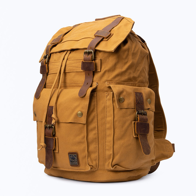 Фото чоловічого вінтажного рюкзака мілітарі канвас холст Фото чоловічого вінтажного рюкзака мілітарі канвас холст