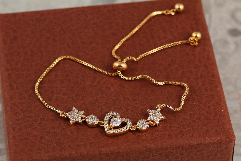 Браслет Xuping Jewelry регульований на бігунці велике серце із зірками з каменів золотистий