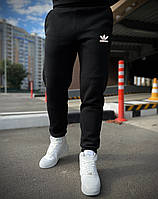 Зимние спортивные штаны Adidas с начесом черные теплые / штаны Адидас на зиму на флисе черного цвета