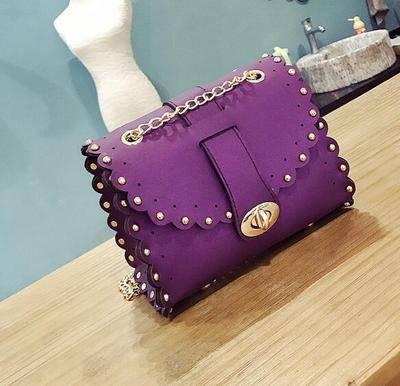 Маленька жіноча фіолетова сумка
