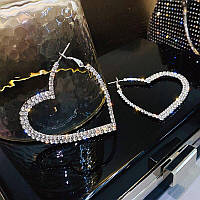 Сріблясті сережки з камінцями у формі серця