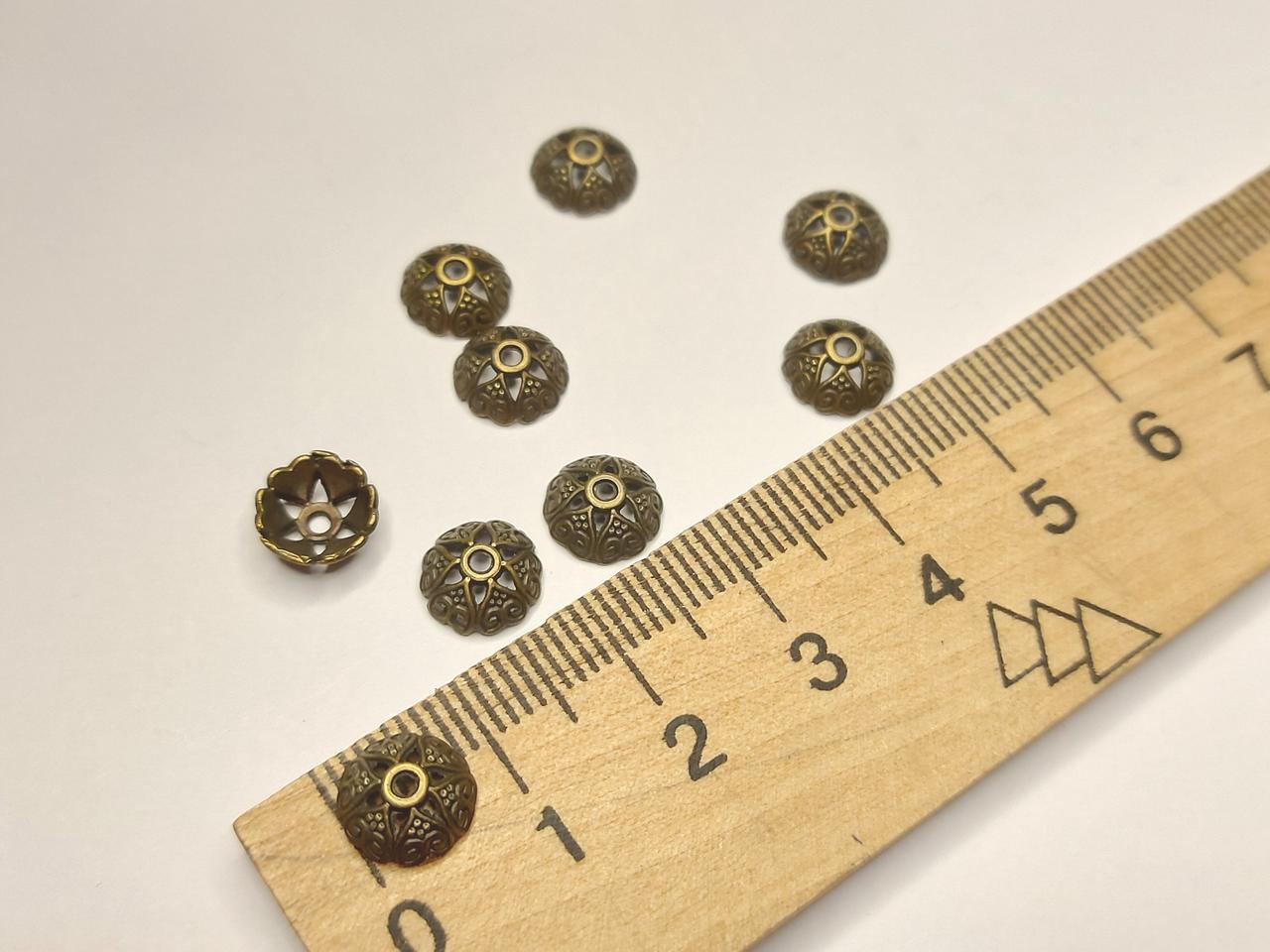 Фурнітура для біжутерії, 3\7 мм. Обіймач для намистини. Колір бронза. Ціна за 10 шт