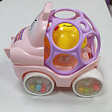 Машинка-погремушка для самих маленьких у рожевому кольорі, фото 2