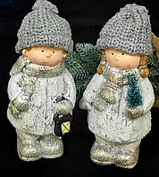 Статуетка дітки в сріблястому