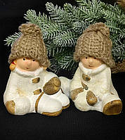 Статуетка дітки зі сніжною кулею