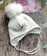 Зимова шапка на зав'язках з хутряним помпоном для дівчинки
